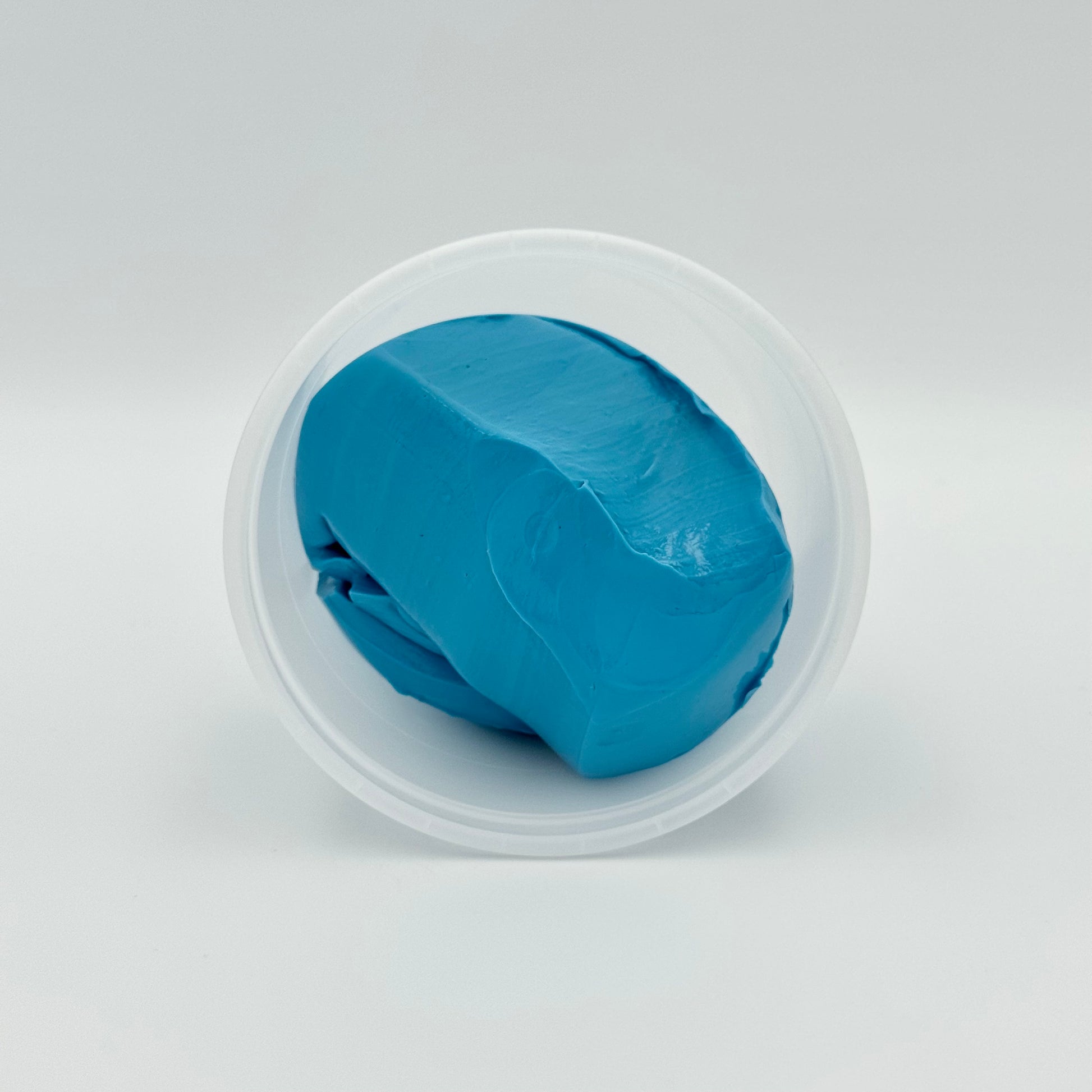 Geöffnete Dose mit blauer Therapieknete Stärke extra fest – Fitness Knete für Handtraining