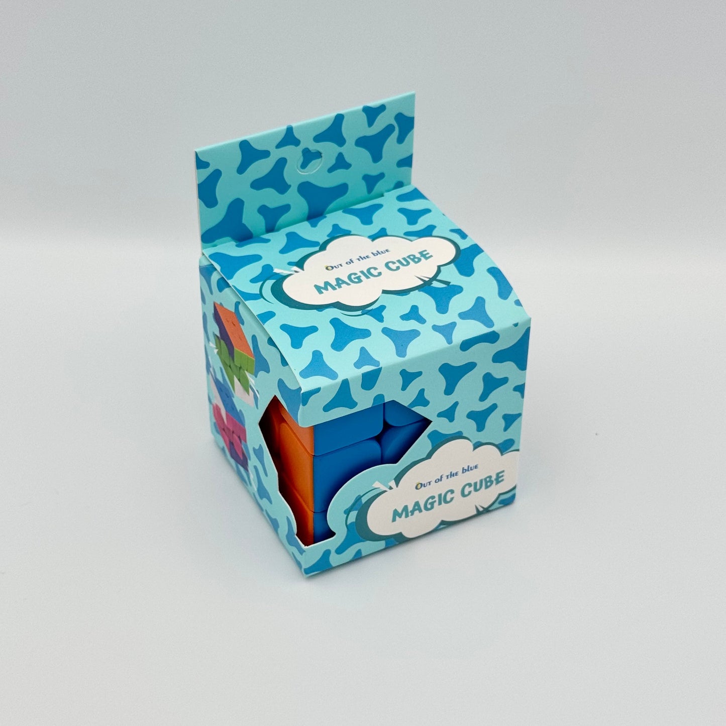 Bunter Magic Cube Zauberwürfel in hellblauer Verpackung von Out of the blue – Geduldsspiel & Fidget Toy