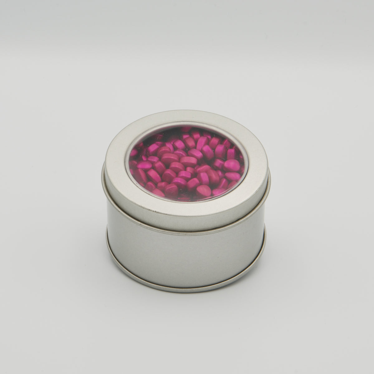 Silberne Dose gefüllt mit pinken magnetischen Knet-Steinen – Fidget Toy Aufbewahrungsdose