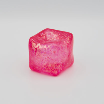 Pinker Glitzer-Squeeze-Würfel mit elastischer Vertiefung auf der Oberseite