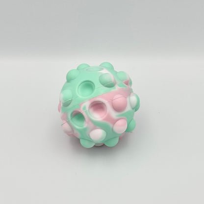 Pastellfarbener Pop It Squeeze Ball mit eingedrückten Blasen – Fidget Toy aus Silikon