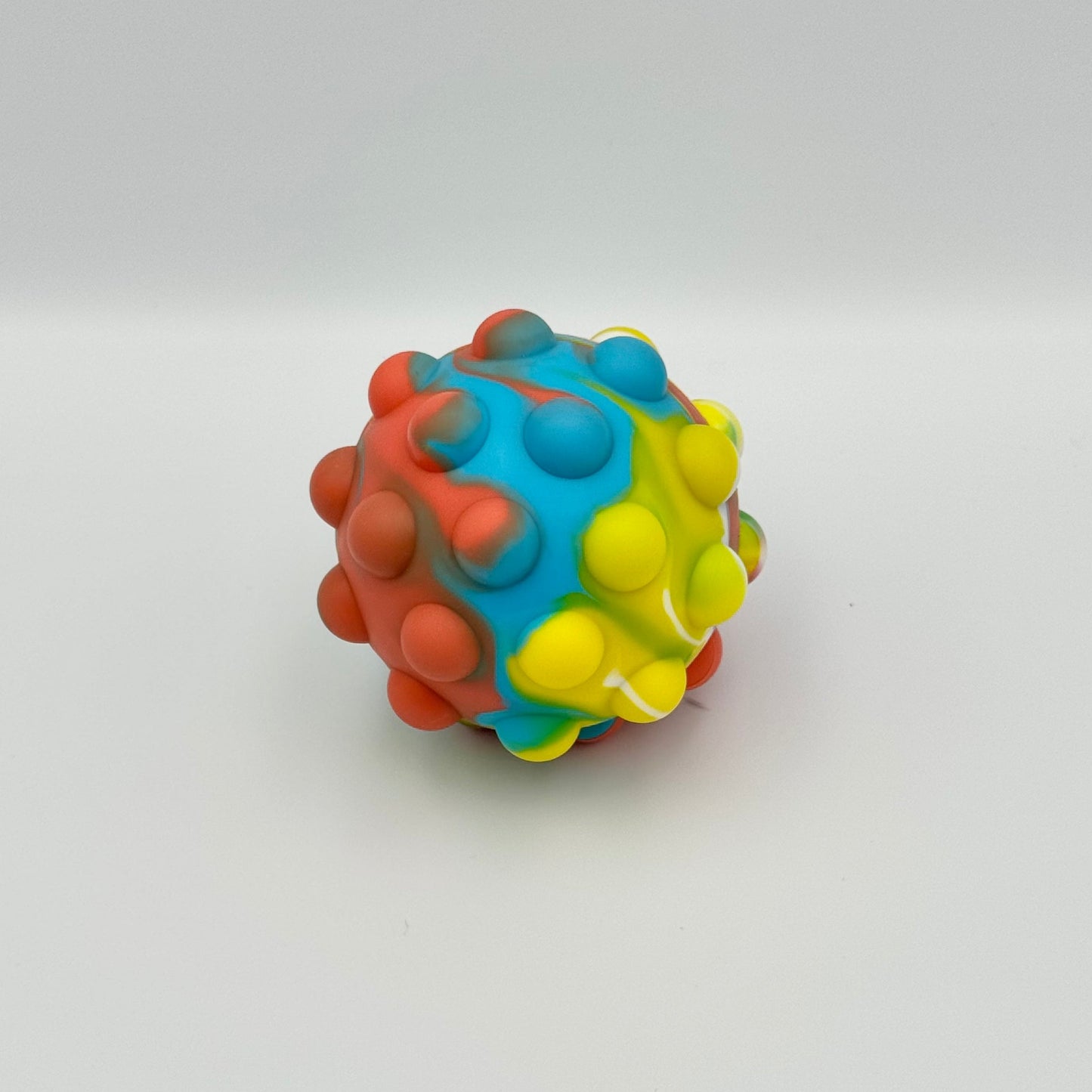Bunter Regenbogen Pop Ball aus Silikon – Haptischer Pop It Squeeze Ball für Hände
