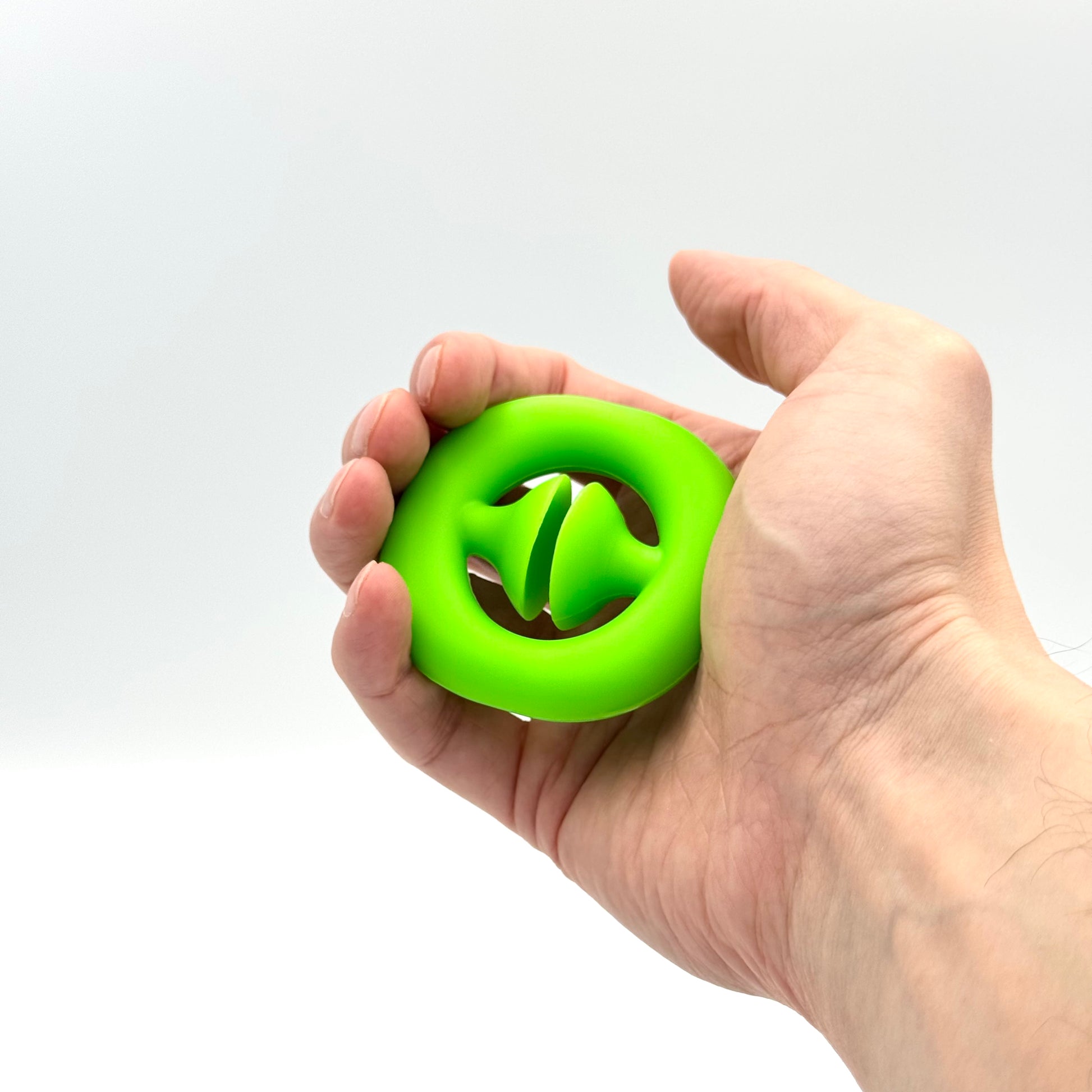 Grüner Pop Snapper Fidget Ring aus Silikon – Saugnapf-Handtrainer