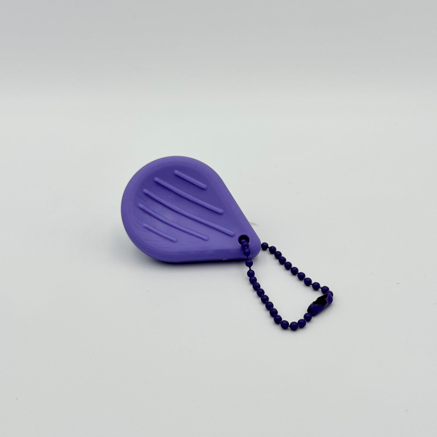 Lila Sensorik Schlüsselanhänger aus Silikon mit Rillen – Tactile Fidget Anhänger für Fokus